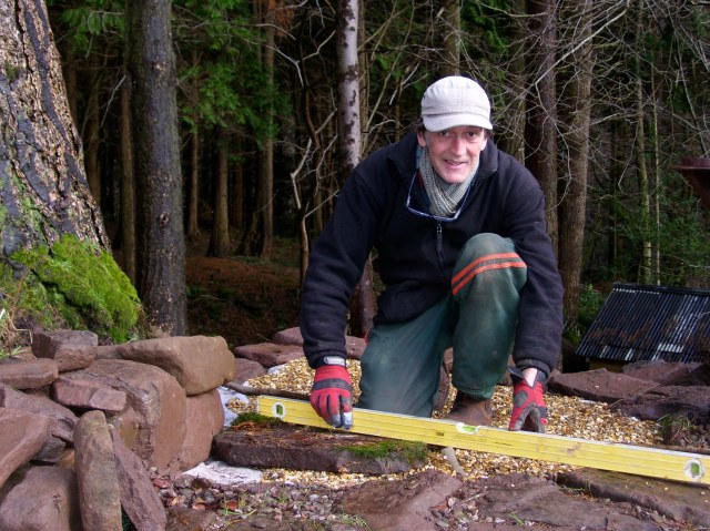 Mick in stone laying action.